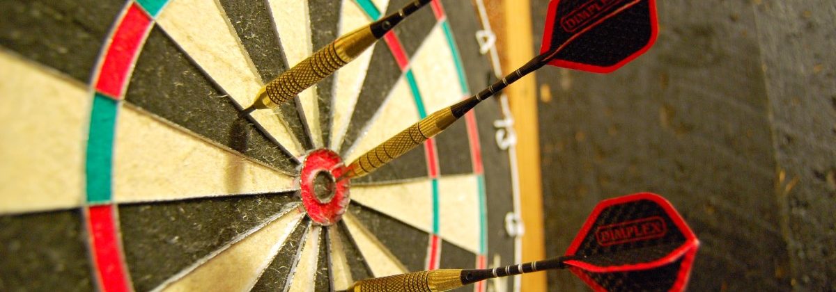 Darts in Dartboard Close Up